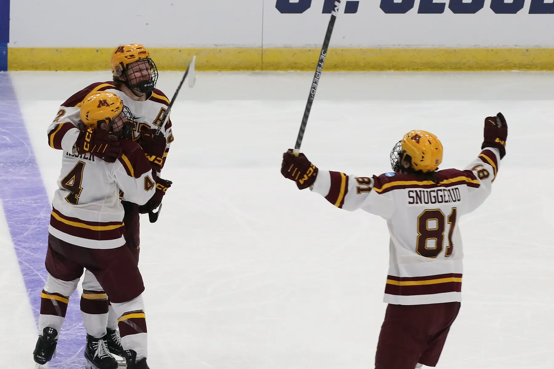 LaCombe celebrates his goal with Koster & Snuggerud. Photo by Craig Cotner