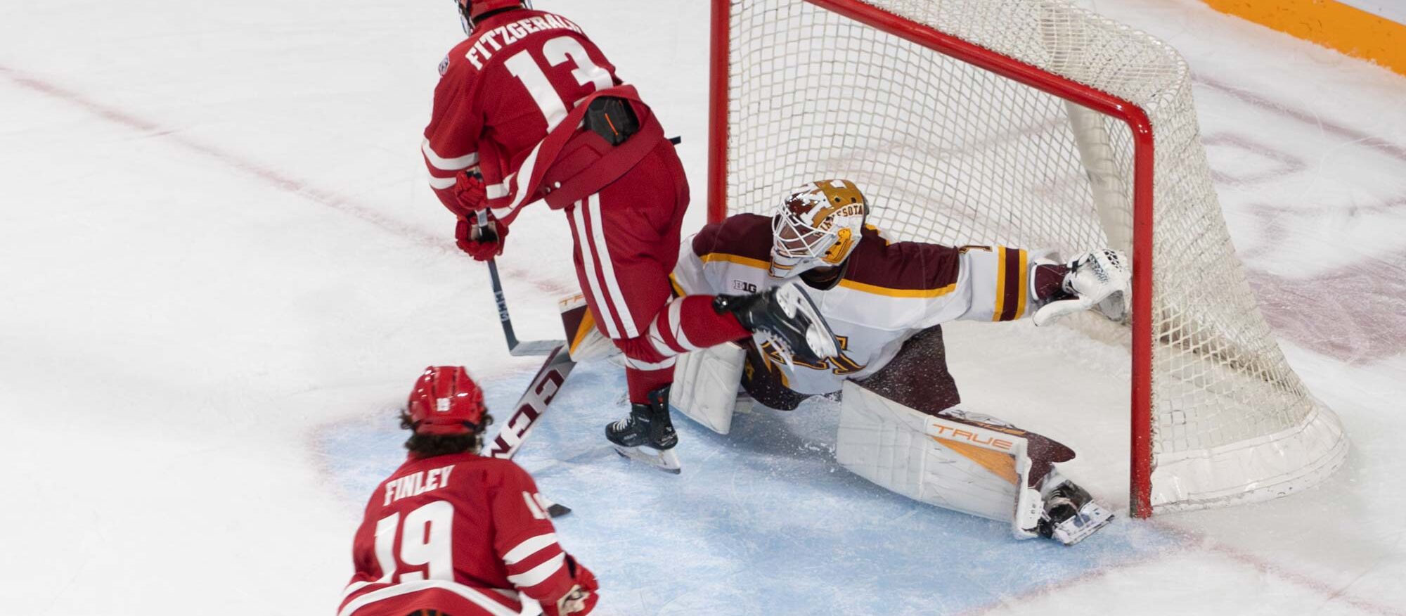 Justen Close makes a big save to keep the Gophers in the game.