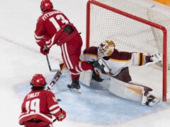 Justen Close makes a big save to keep the Gophers in the game.