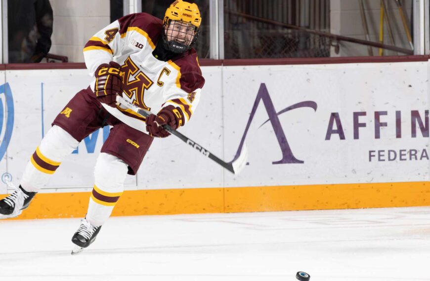 Mike Koster passes the puck