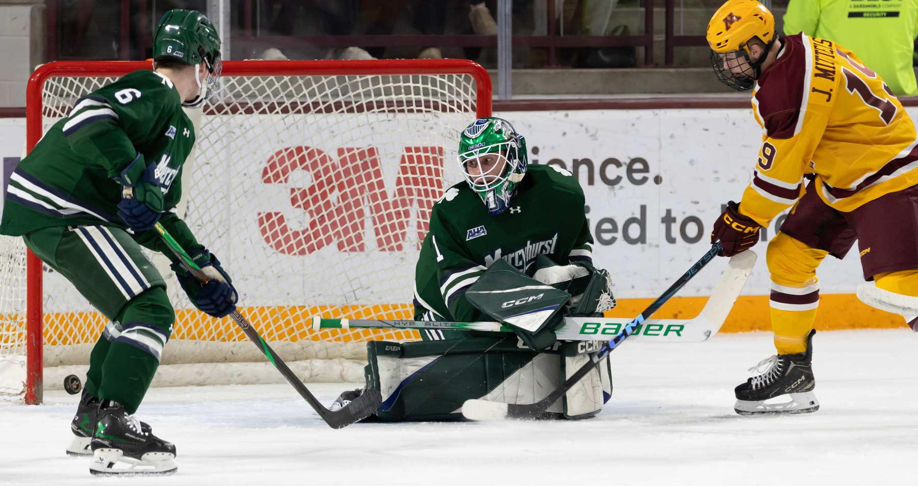 Mercyhurst's Michael Chambre looks back on a Ryan Chesley goal. Photo by Craig Cotner.