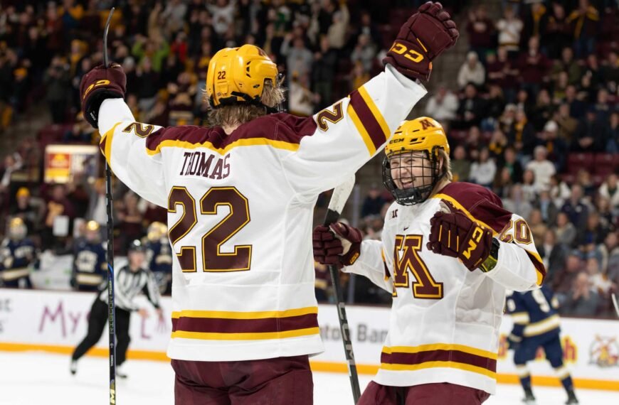 Cal Thomas celebrates a goal with Luke Mittelstadt. Photo by Craig Cotner.