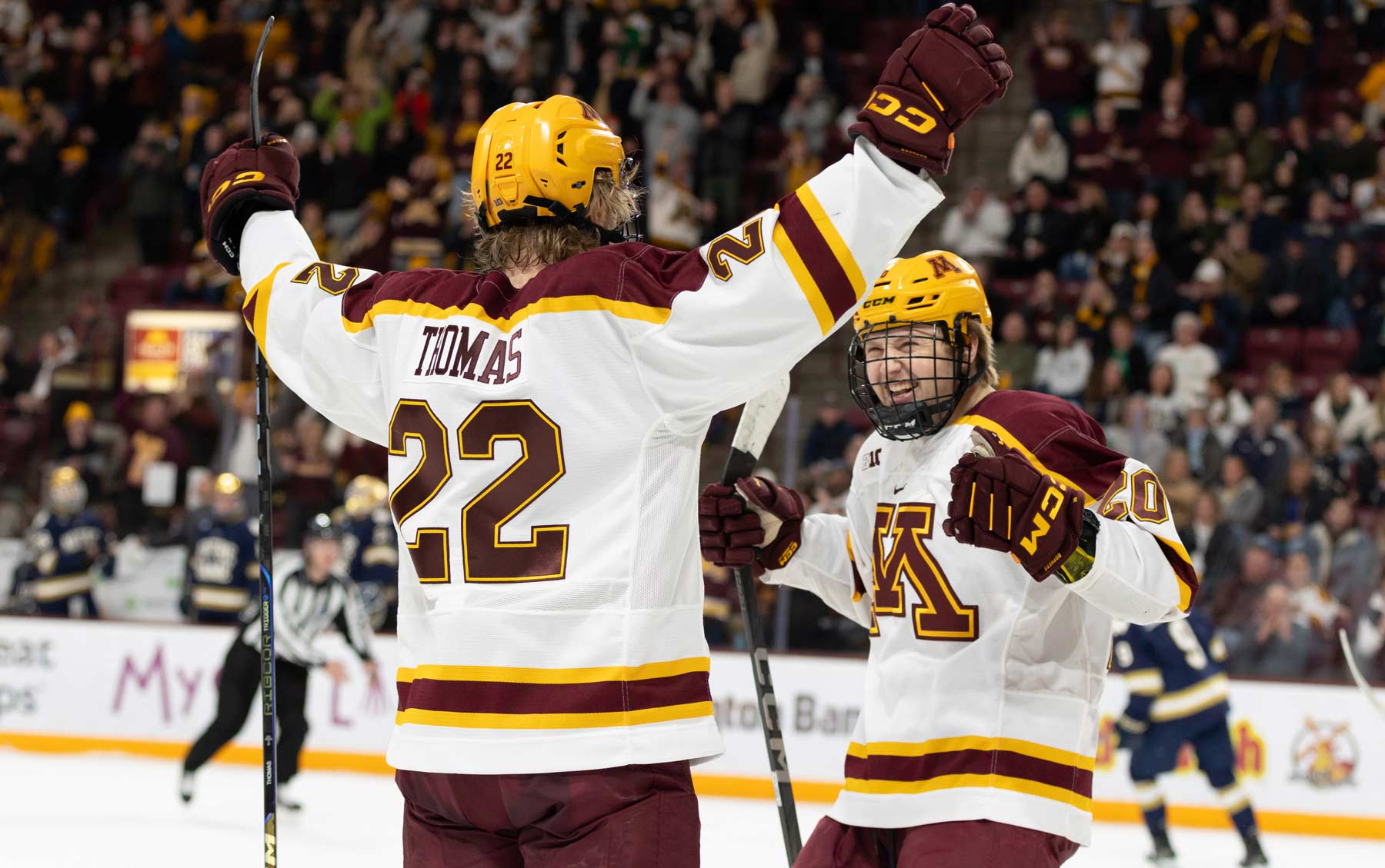 Cal Thomas celebrates a goal with Luke Mittelstadt.