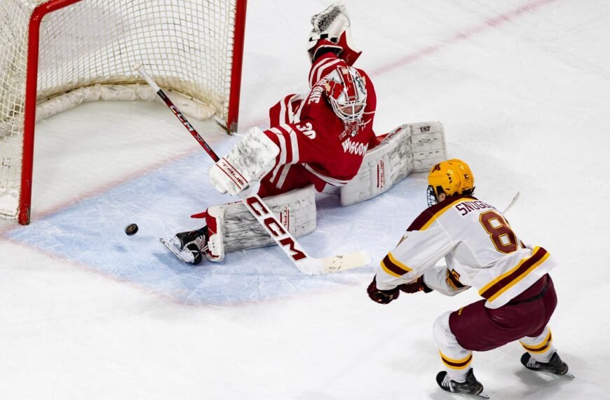 Jimmy Snuggerud with a huge goal to put the BADgers away! Photo by Craig Cotner.