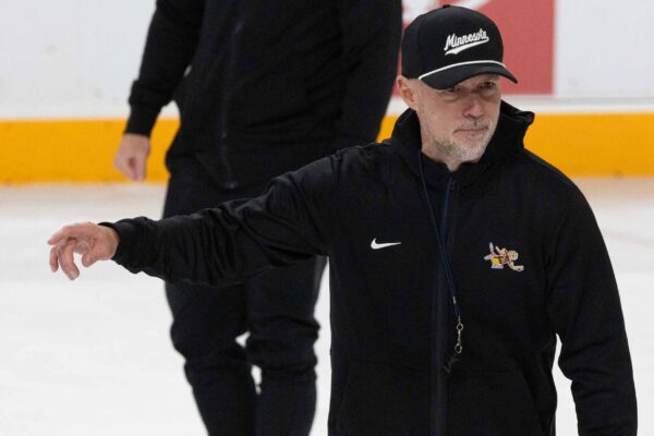 Brett Larson prepping the team during practice. Photo by Craig Cotner.